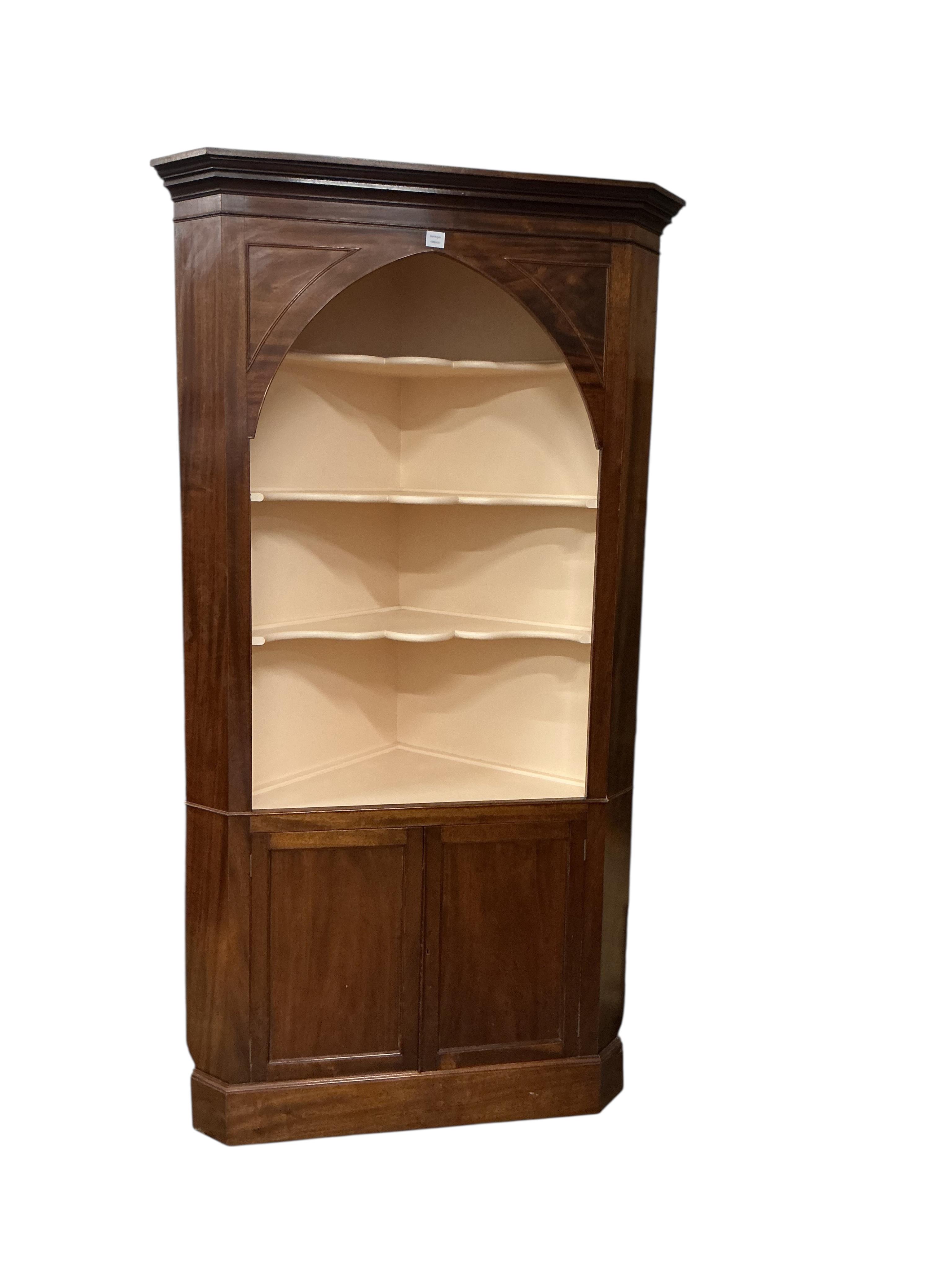 A George III style mahogany standing corner cupboard, width 120cm, depth 60cm, height 223cm